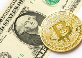 Infografis perbandingan Bitcoin vs Dolar AS sebagai penyimpan nilai di hari Ulang Tahun Satoshi Nakamoto